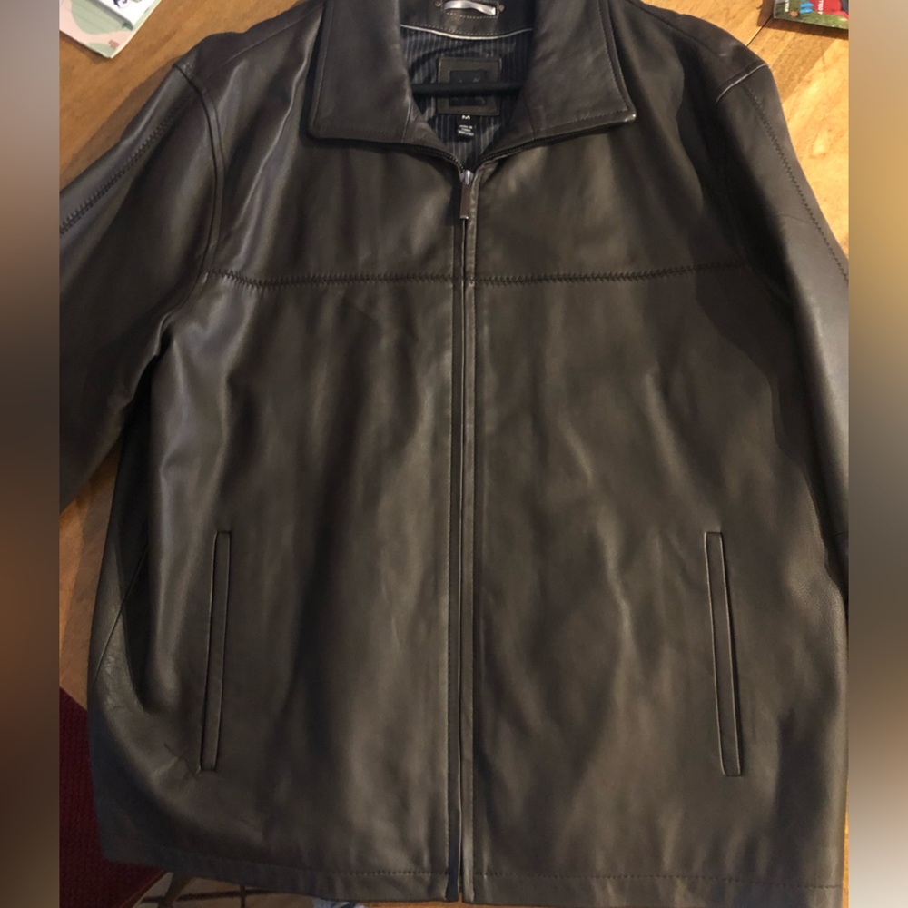 Mens brown leather jacket. Size Med. Excellent condition. Hardly worn